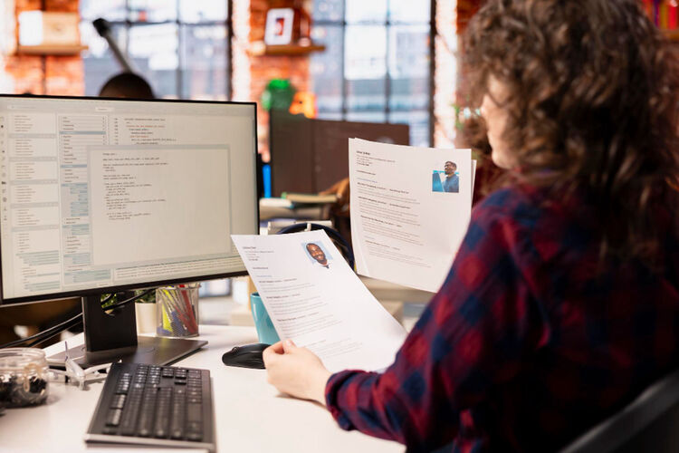 A female recruiter looking at skills not degrees of candidates when hiring for a job role
