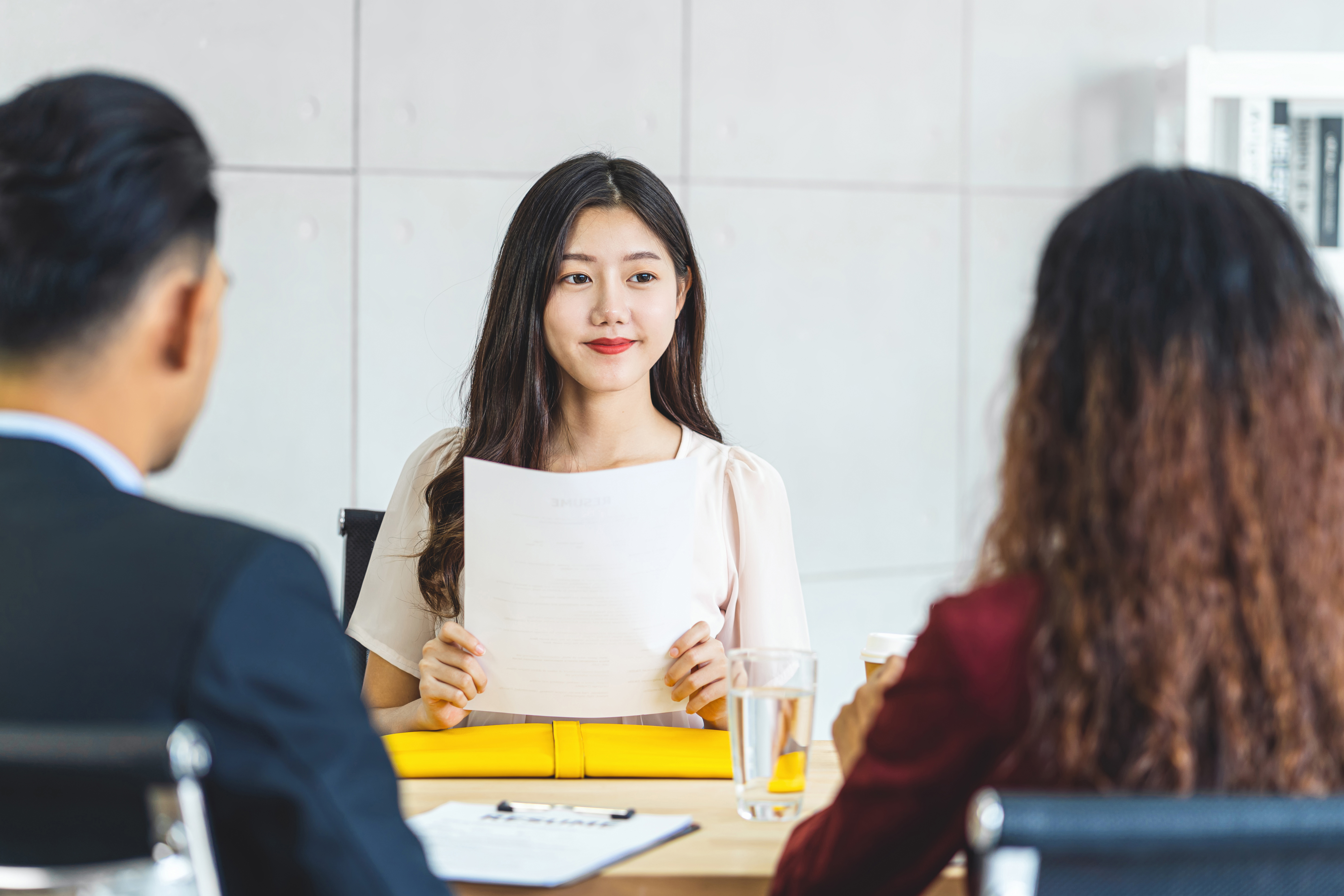 Candidate explaining their reasons for leaving a job to the recruiter during an interview.