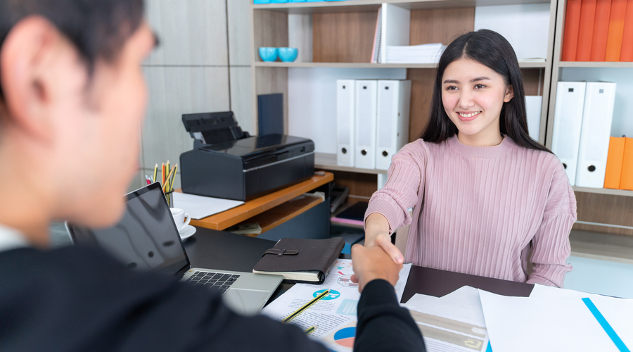 Young Working Woman Check Hands With Businessman