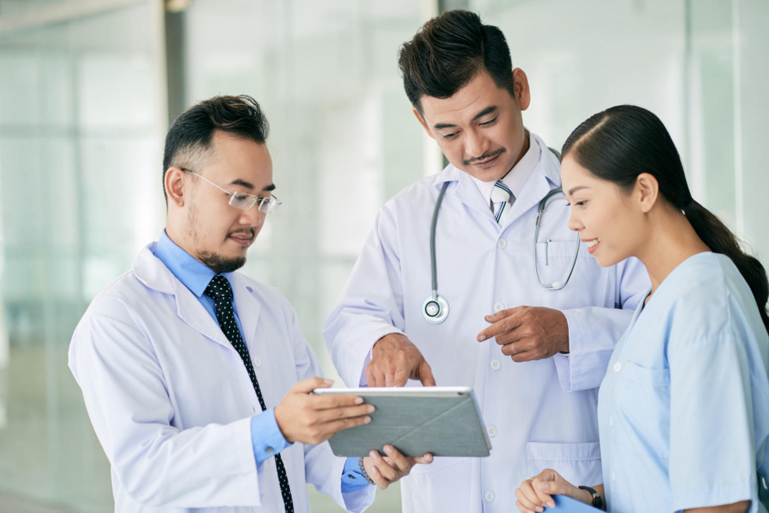 Healthcare and life sciences increasingly leverage technology, such as surgeons using advanced equipment during operations
