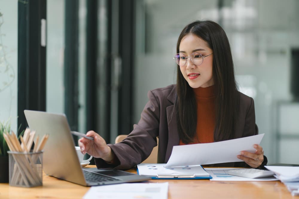 Employee looking through statutory compliance in HR
